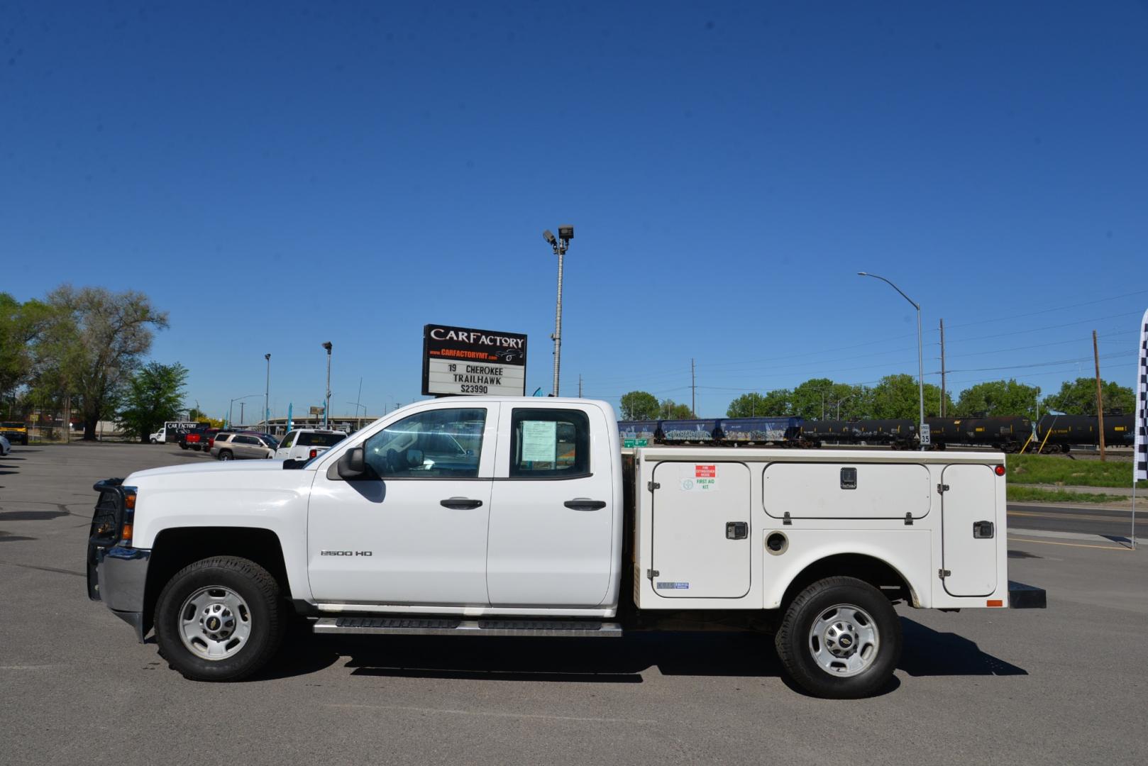 2015 White /Gray Chevrolet Silverado 2500HD Service Body Double Cab 4WD (1GB2KUEG6FZ) with an 6.0 Gasoline V8 engine, Automatic transmission, located at 4562 State Avenue, Billings, MT, 59101, (406) 896-9833, 45.769516, -108.526772 - Photo#1